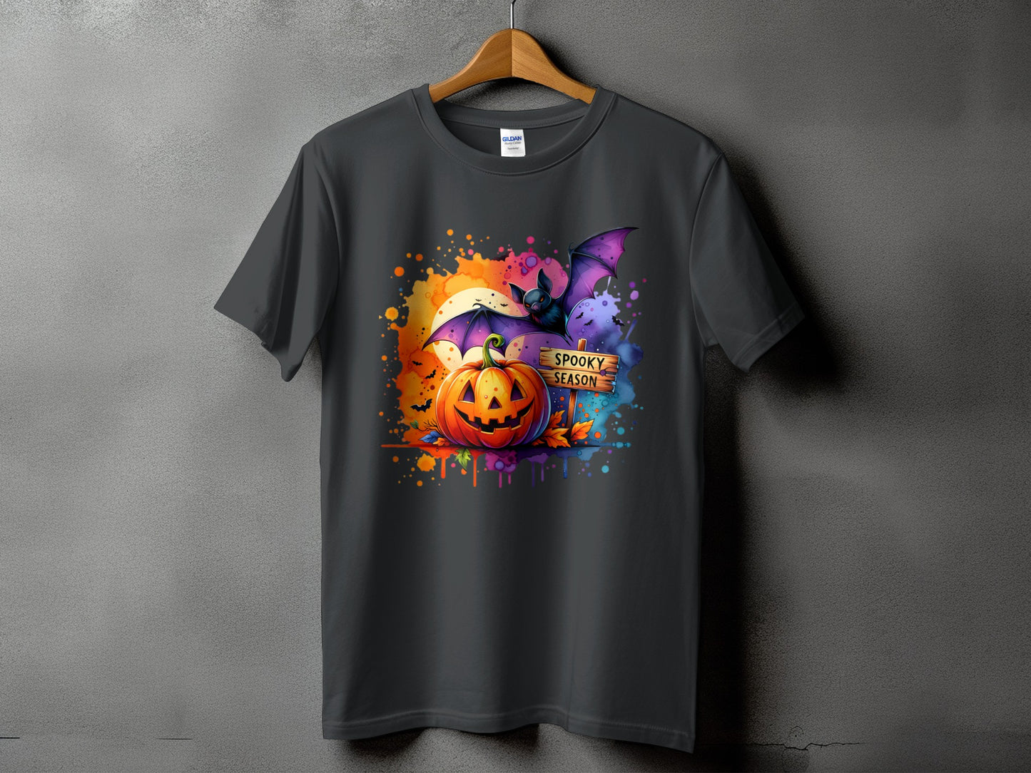 Halloween t-shirt with a jack-o'-lantern, bat, and "Spooky Season" sign.