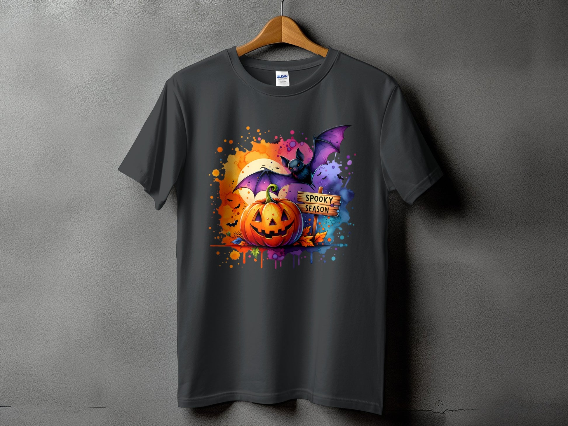 Halloween t-shirt with a jack-o'-lantern, bat, and "Spooky Season" sign.