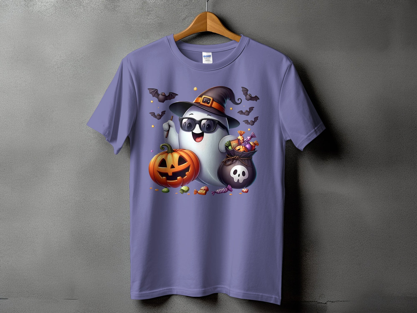 T-shirt with a happy ghost wearing a witch hat and sunglasses holding candy.