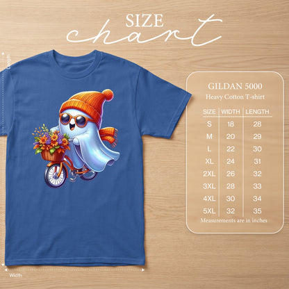 Blue t-shirt with a ghost riding a bicycle, with a size chart.