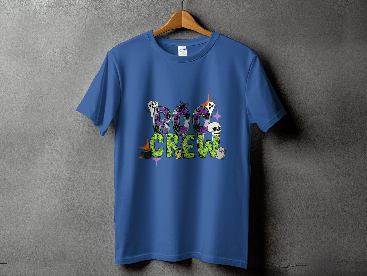 Blue t-shirt with "Boo Crew" text and Halloween-themed graphics.