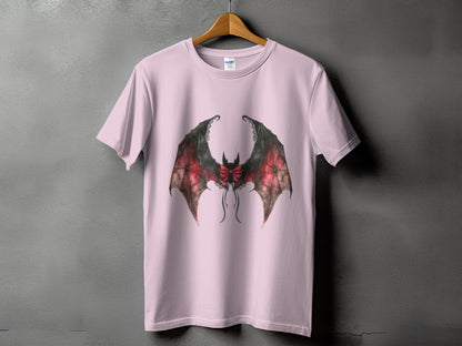 Pink t-shirt with large, detailed bat wings graphic and bow detail.