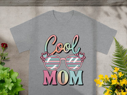 Grey t-shirt with colorful "Cool MOM" text and sunglasses graphic.