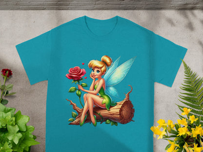 Fairy with wings holding a rose sitting on a log.