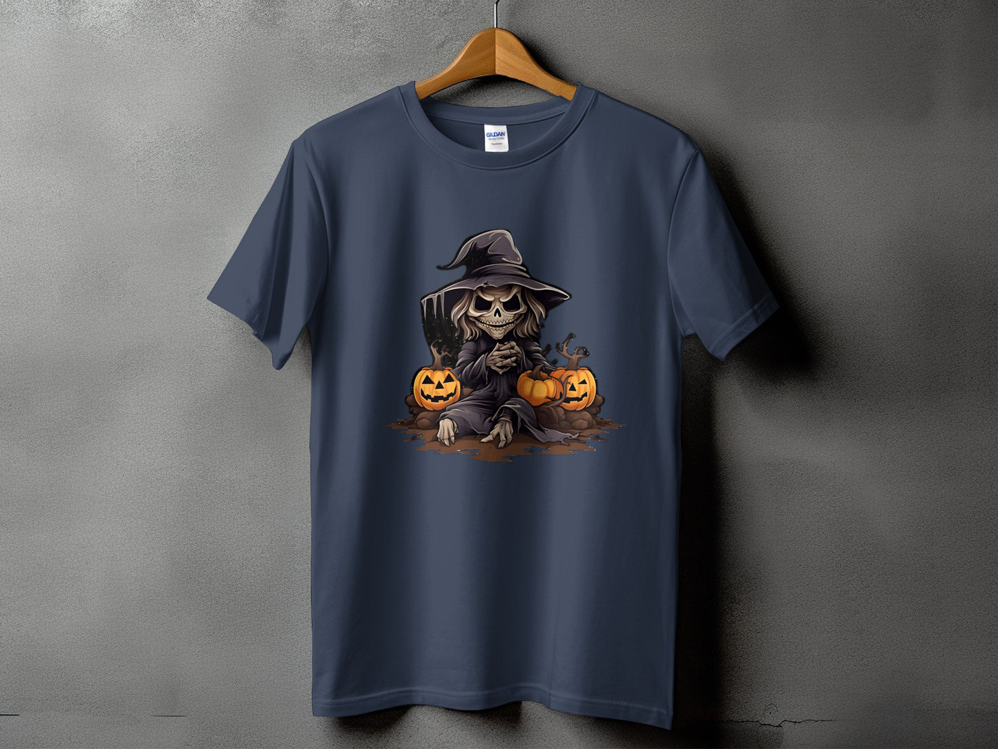 Dark blue t-shirt with a Halloween graphic of a skeleton witch and pumpkins.