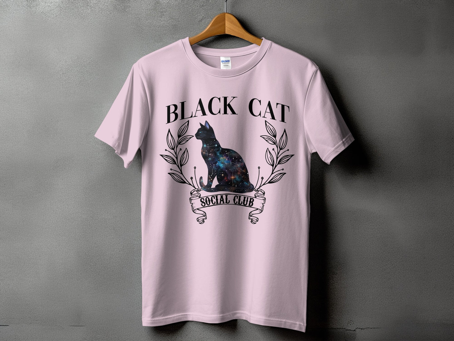 Pink t-shirt with "Black Cat Social Club" text and galaxy cat graphic.