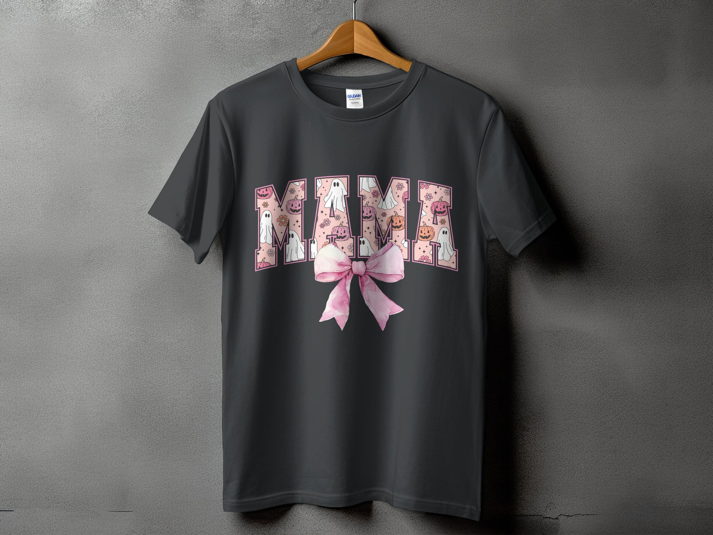 Dark gray t-shirt with "MAMA" text filled with Halloween ghosts, pumpkins, and flowers.