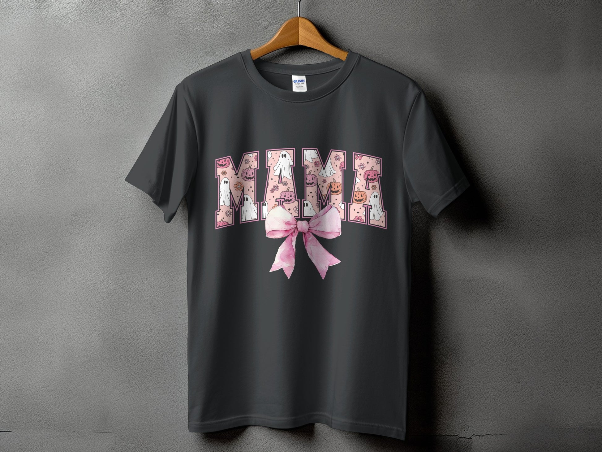 Dark gray t-shirt with "MAMA" text filled with Halloween ghosts, pumpkins, and flowers.