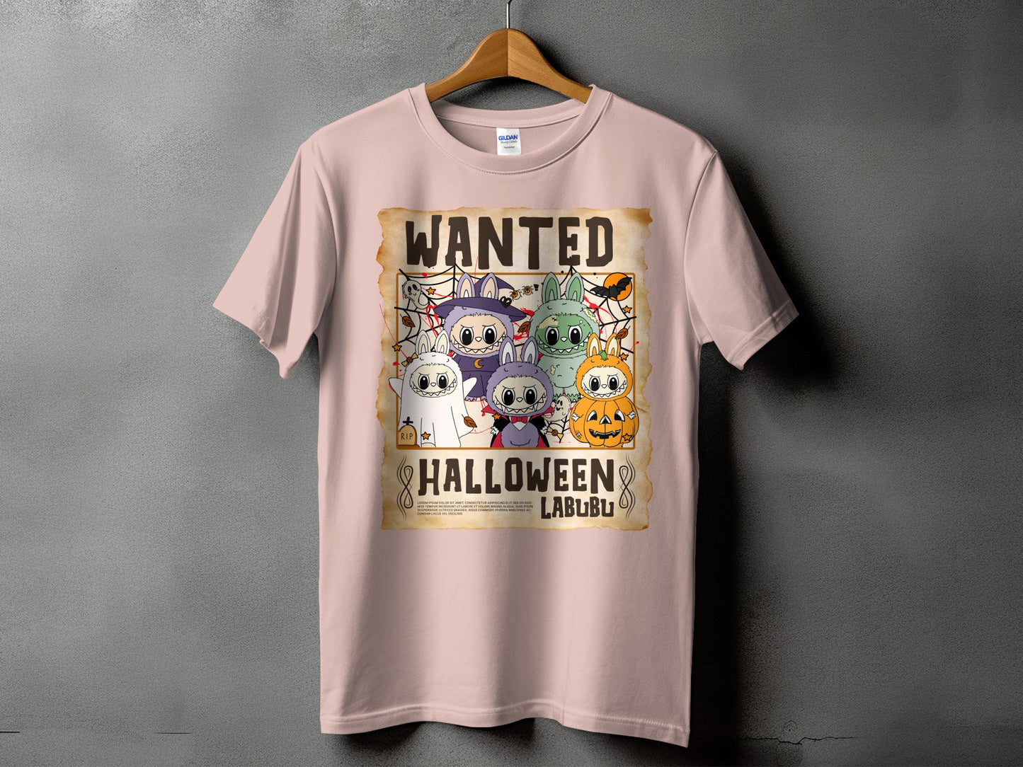 Pink t-shirt with "Wanted Halloween Labubu" graphic featuring cartoon characters and a pumpkin.
