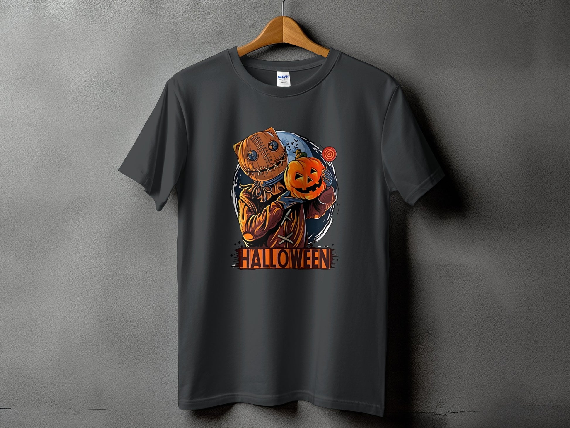 Dark grey t-shirt with a Halloween character holding a pumpkin and lollipop.