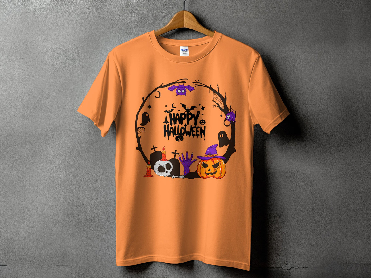 Orange t-shirt with "A Happy Halloween" text and spooky graphics in a circular design.