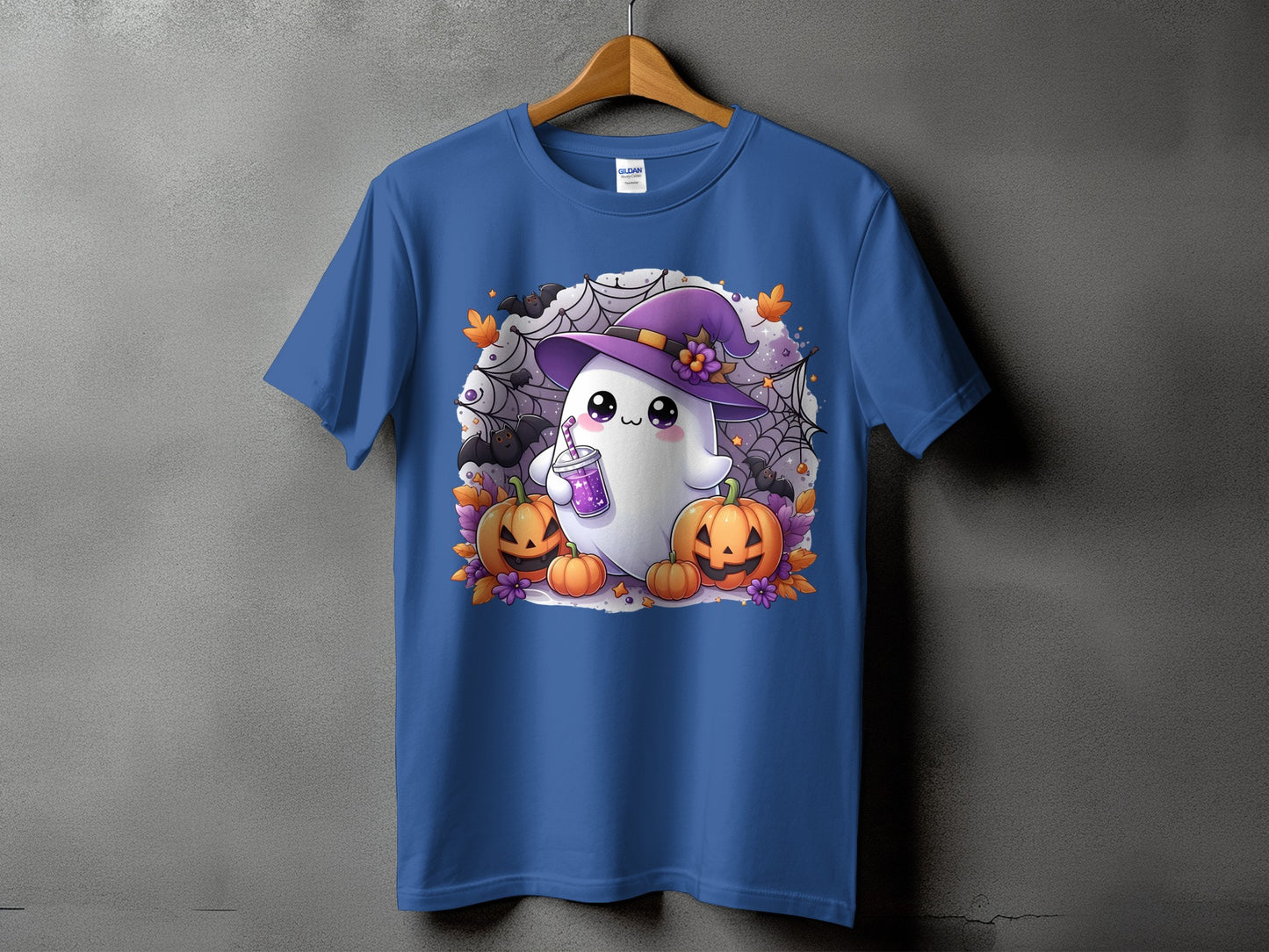 Halloween t-shirt featuring a cute ghost in a witch hat with pumpkins and bats.