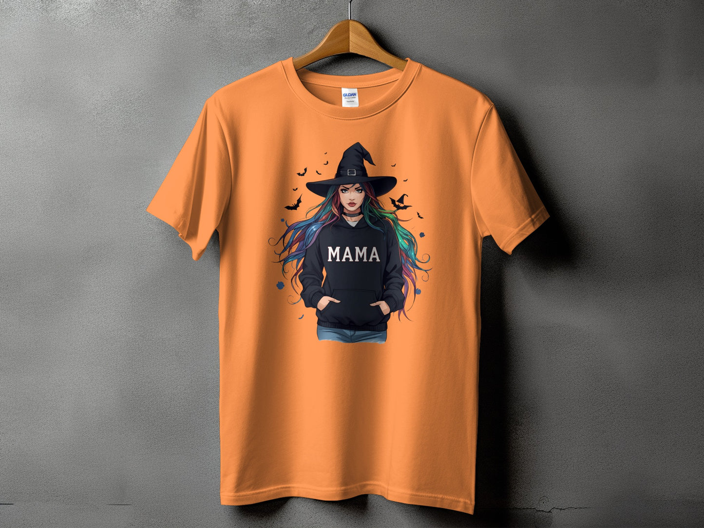 Orange t-shirt with witch graphic and "MAMA" text on black hoodie.