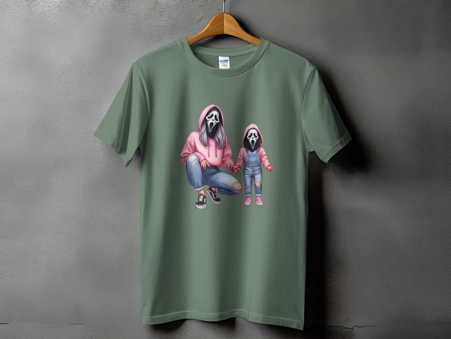 T-shirt with graphic of two figures in Scream masks, one adult, one child.