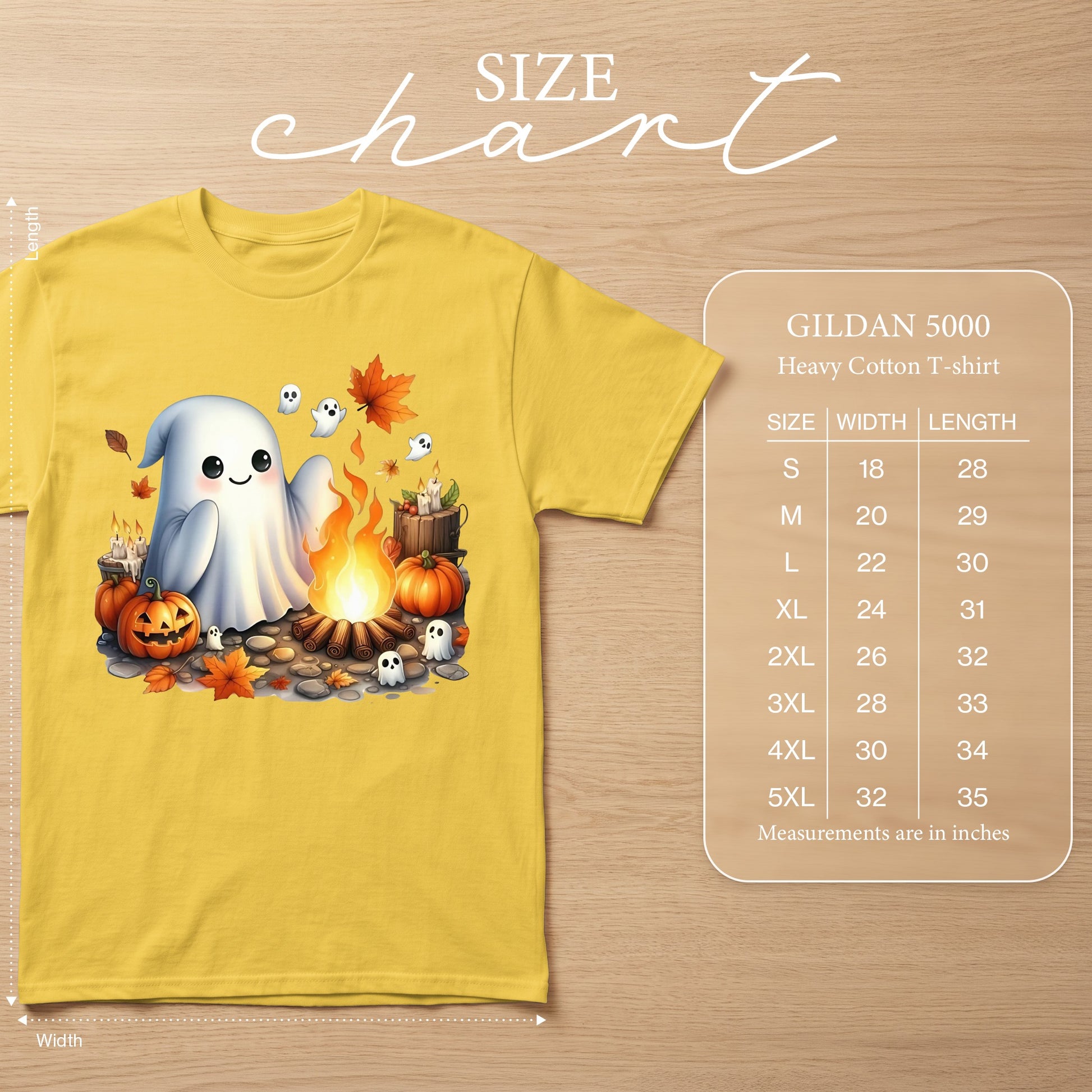 Yellow t-shirt with cute ghost, pumpkins, and campfire Halloween graphic and size chart.