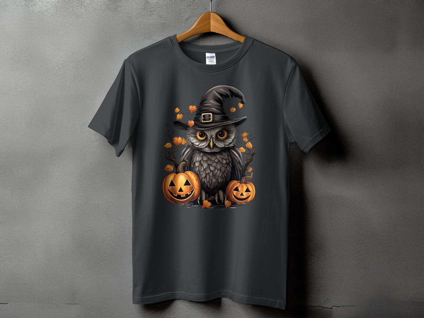 Dark grey t-shirt with Halloween owl and pumpkins graphic.