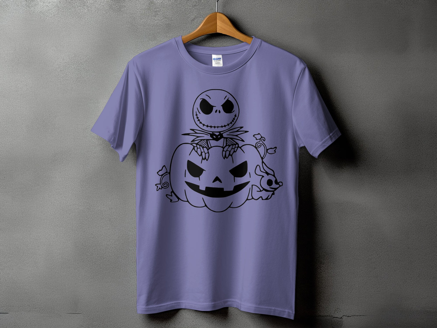Purple t-shirt with black line art of Jack Skellington sitting on a pumpkin.