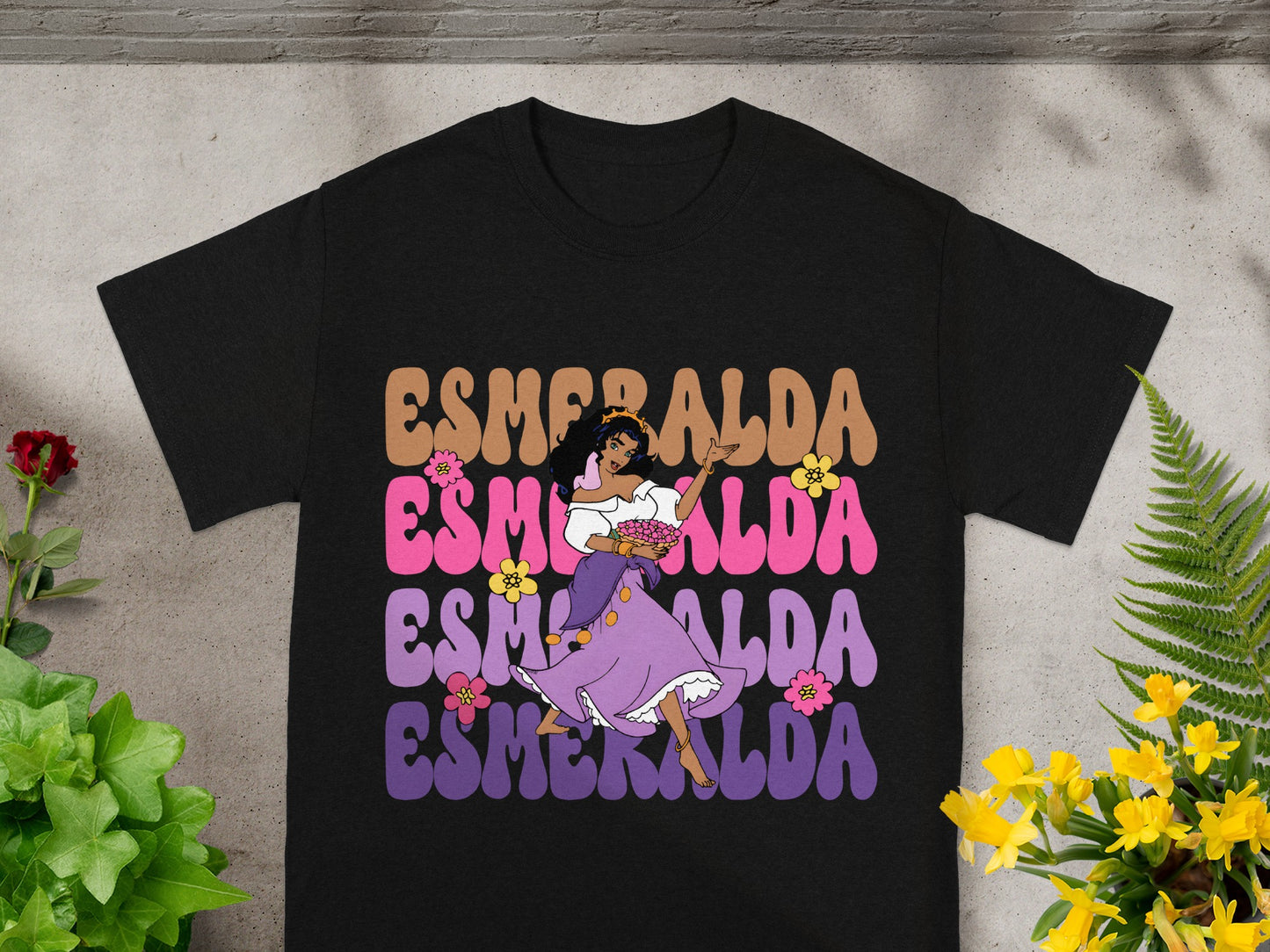 Black t-shirt with Esmeralda graphic in colorful retro lettering.