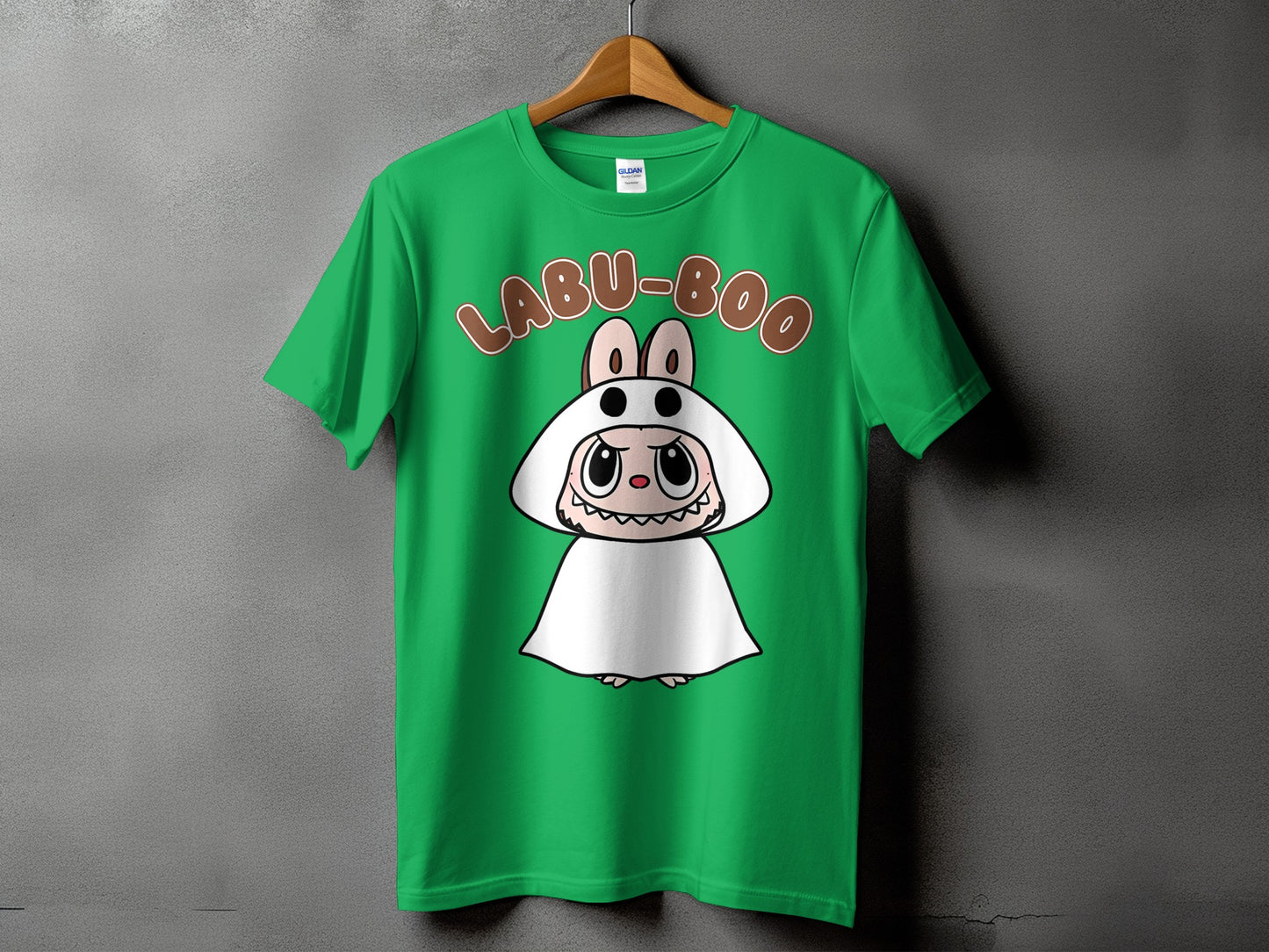 Green t-shirt with "LABU-BOO" text and a cartoon character in a white costume.