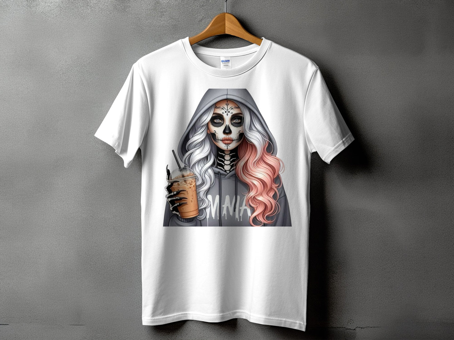 White t-shirt with skeleton woman graphic holding a coffee cup, wearing a gray hoodie.