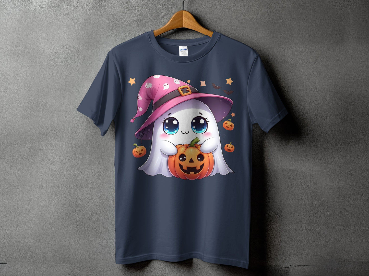 Cute ghost wearing a witch hat holds a jack-o'-lantern on a dark blue t-shirt.