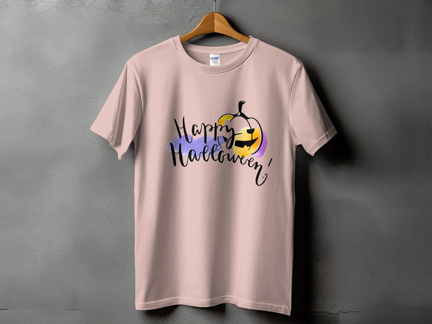 Light pink t-shirt with "Happy Halloween!" and a watercolor pumpkin graphic.
