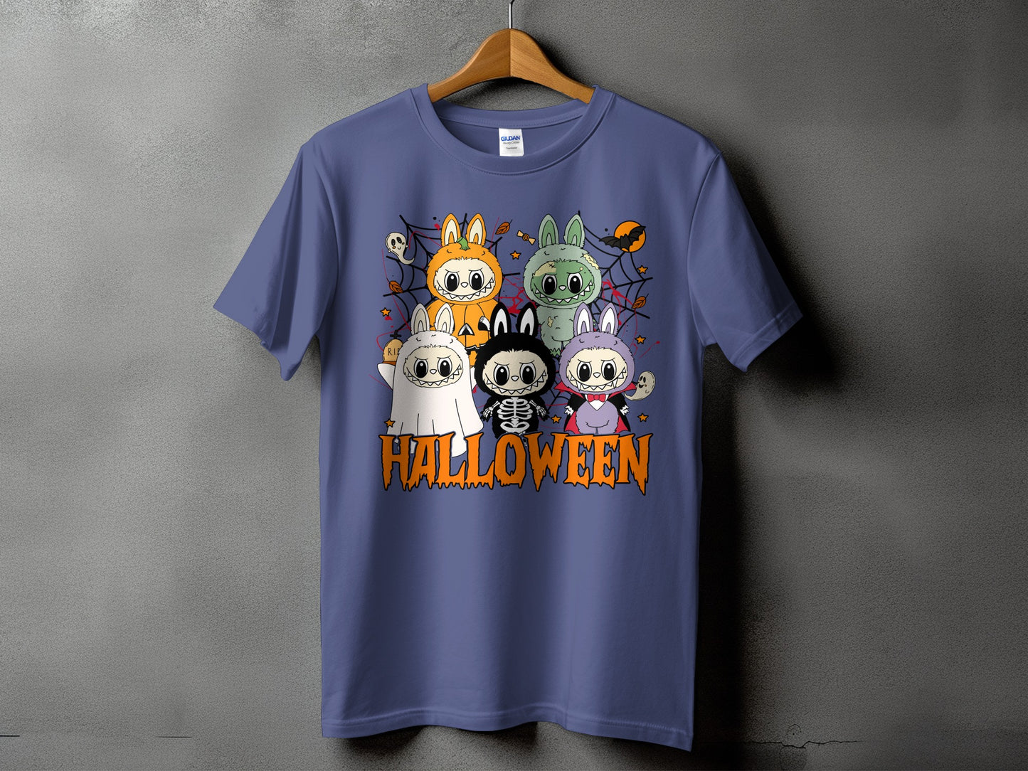 T-shirt with cartoon Halloween characters and the word HALLOWEEN in orange text.