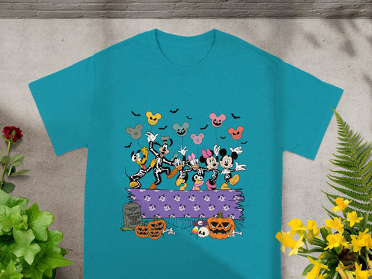 Mickey Mouse characters in skeleton costumes dance with Halloween balloons and pumpkins.