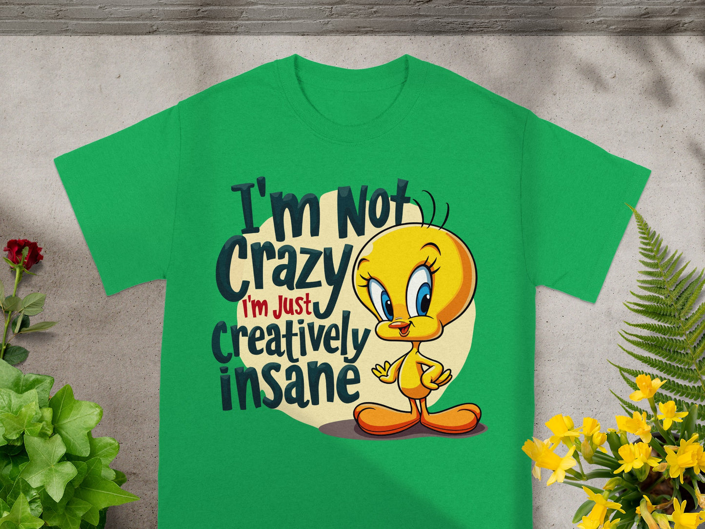 Green t-shirt with Tweety Bird and text "I'm not crazy, I'm just creatively insane."
