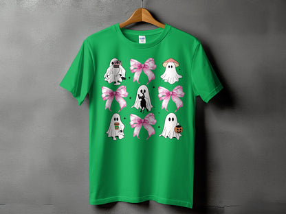 Green t-shirt with a collage of cute ghosts, bows, and Halloween motifs.