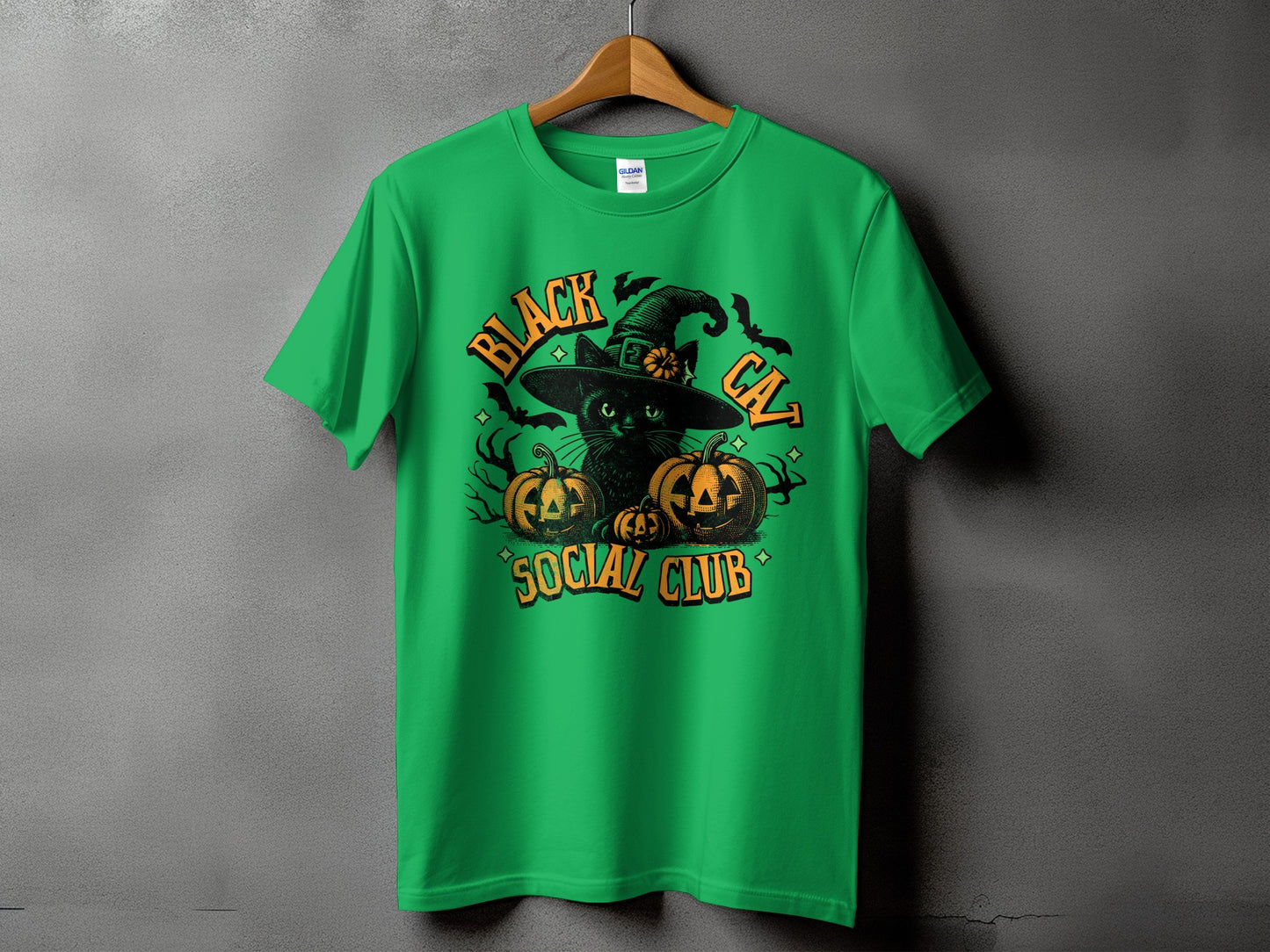 Green t-shirt with black cat, pumpkins, and "Black Cat Social Club" text.