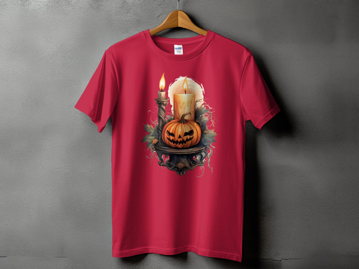Red t-shirt with a Halloween pumpkin and candles graphic on the front.