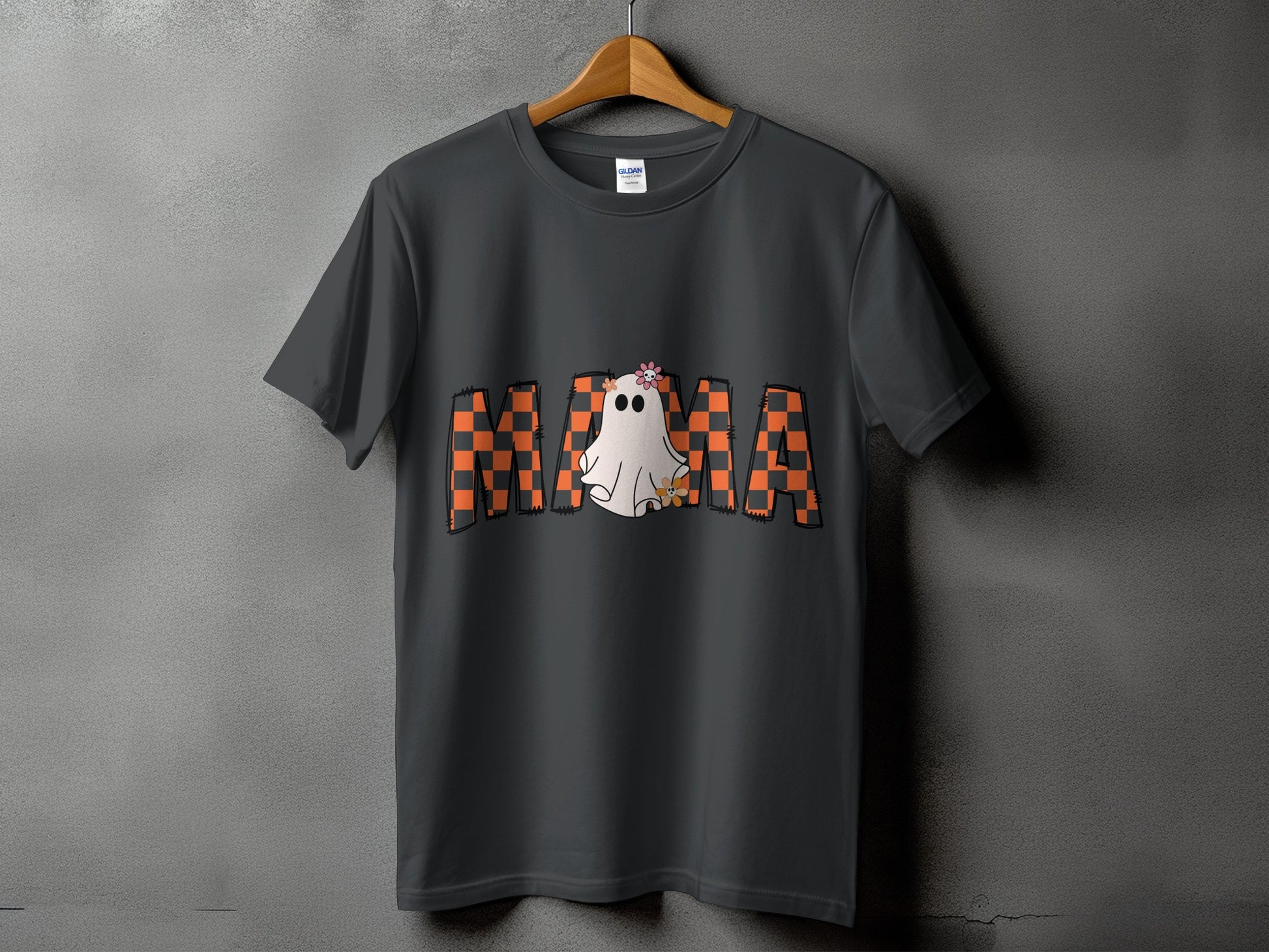 Dark grey t-shirt with "MAMA" text and a ghost graphic.