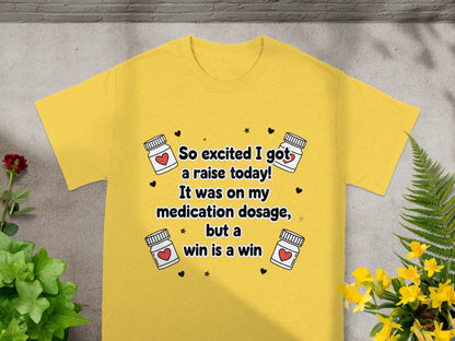 Yellow t-shirt with text about a raise in medication dosage.