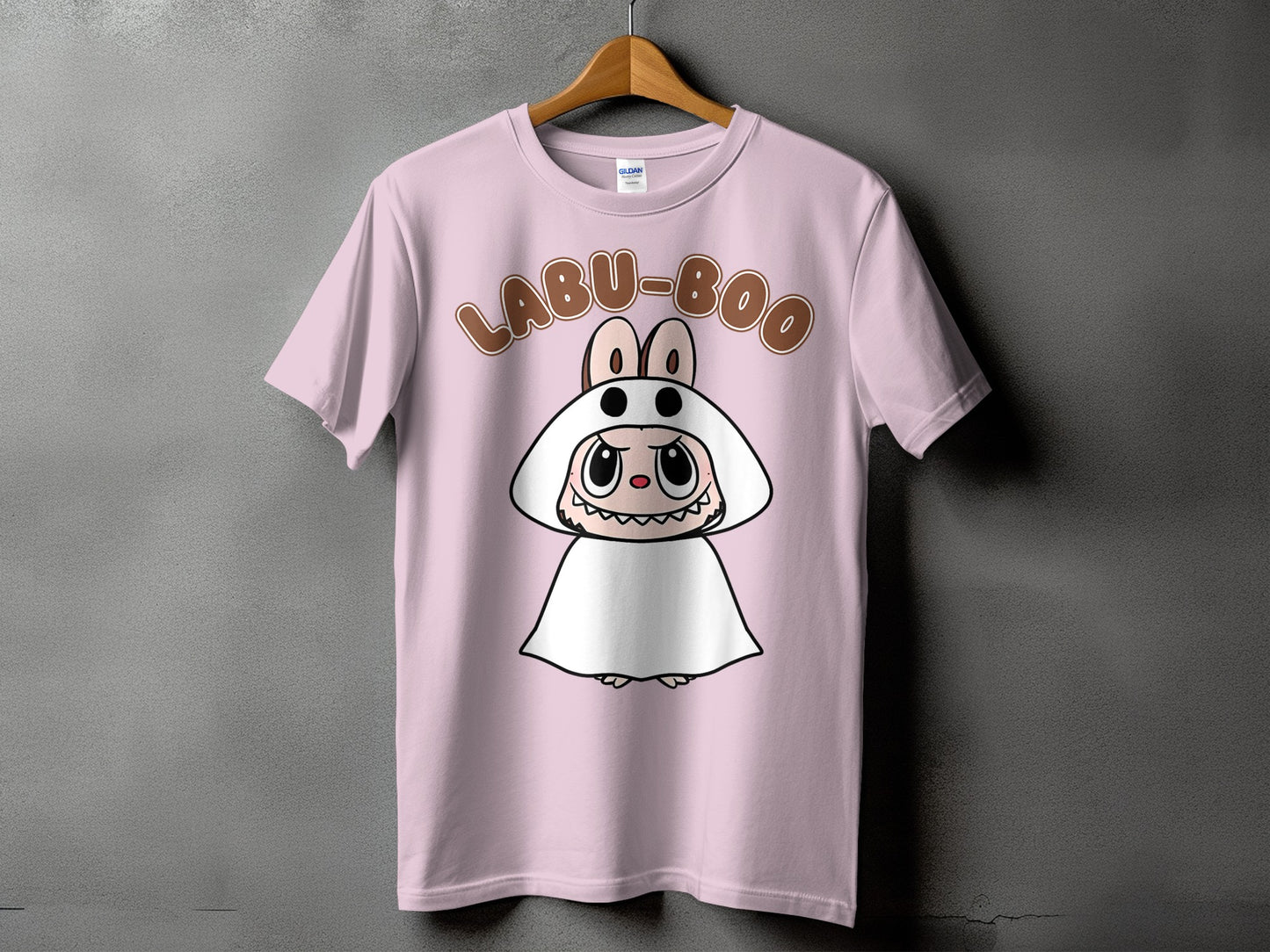 Pink t-shirt with "LABU-BOO" text and a cartoon character in a ghost costume.