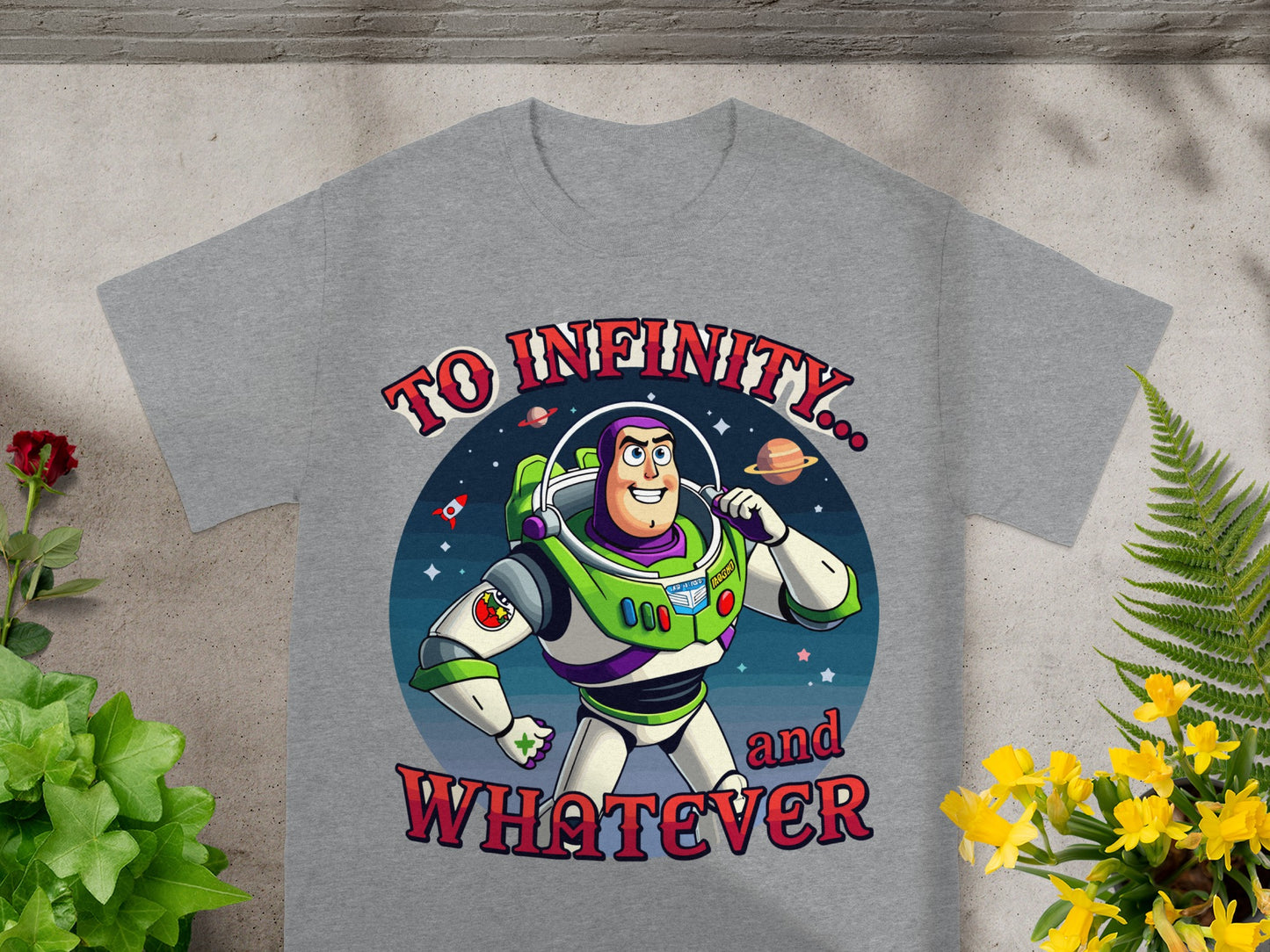 Buzz Lightyear with "To Infinity... and Whatever" text on a gray t-shirt.