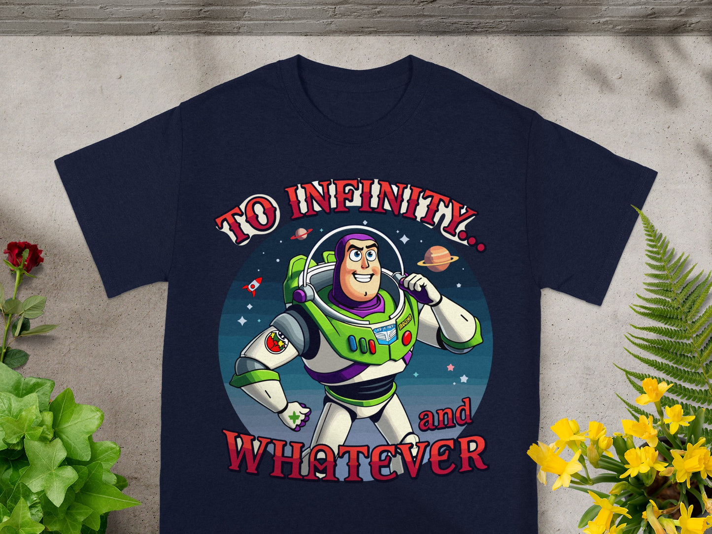 Buzz Lightyear graphic with "To Infinity and Whatever" text on a navy t-shirt.
