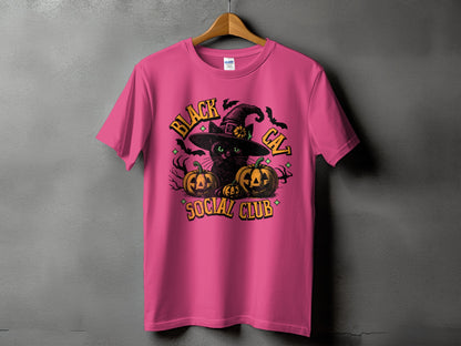 Pink t-shirt with Halloween graphic: black cat, pumpkins, and text.