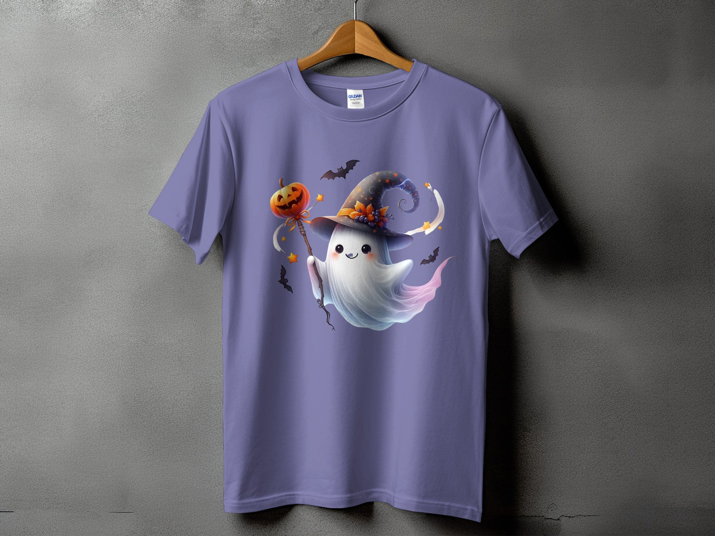 Purple t-shirt with a cute ghost wearing a witch hat holding a pumpkin.