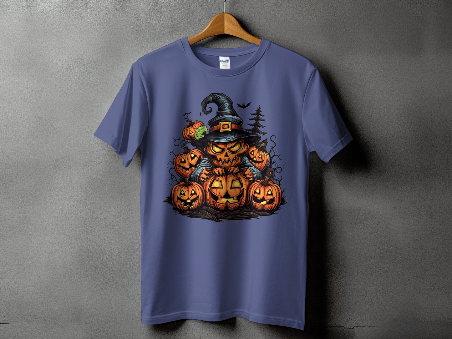 T-shirt with cartoon jack-o'-lantern wearing a witch hat and surrounding pumpkins.