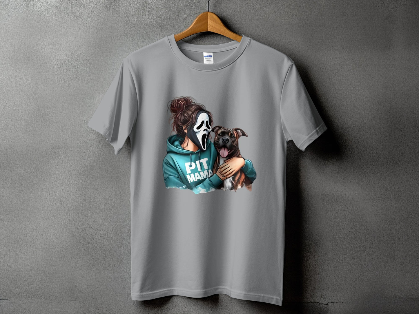Woman in Ghostface mask hugs pit bull dog with "PIT MAMA" text.