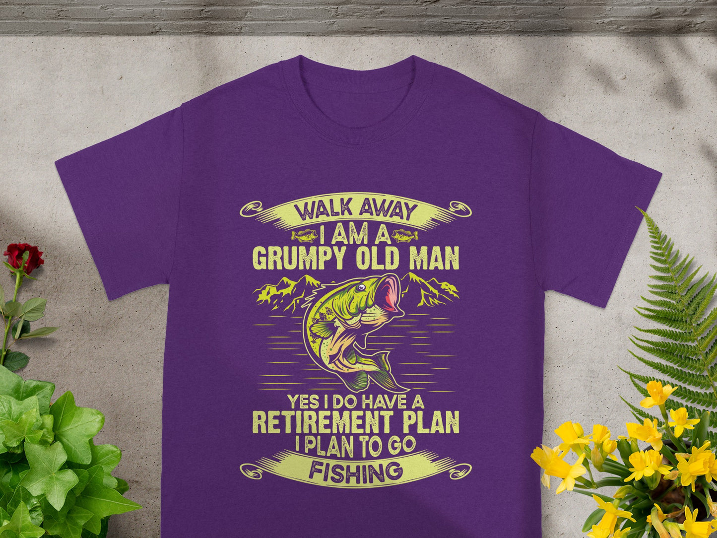 Purple t-shirt with text: "Walk away I Am A Grumpy Old Man. Yes I Do Have A Retirement Plan. I Plan To Go Fishing."