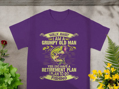 Purple t-shirt with text: "Walk away I Am A Grumpy Old Man. Yes I Do Have A Retirement Plan. I Plan To Go Fishing."