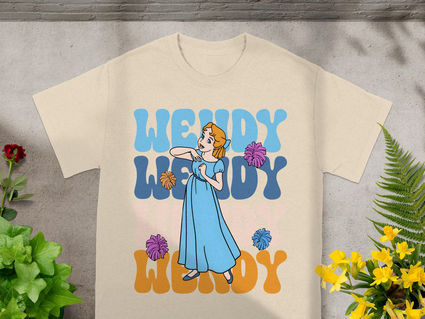 Cream t-shirt with Wendy in a blue dress and "WENDY WENDY WENDY" text.