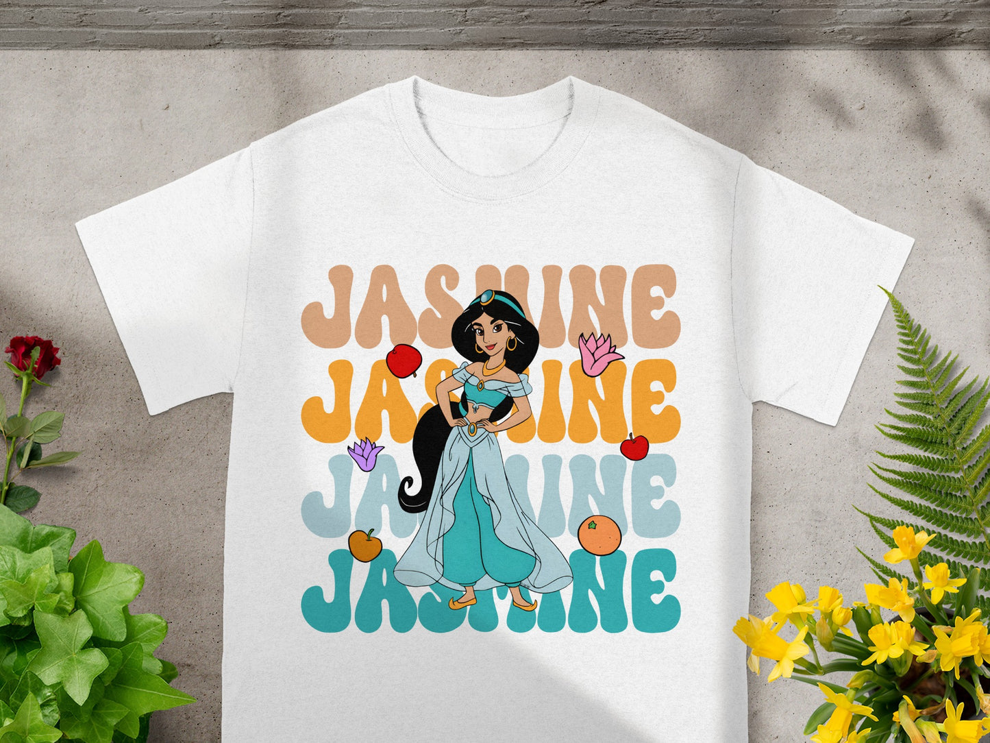 Princess Jasmine on a white t-shirt with "Jasmine" text in colorful letters.