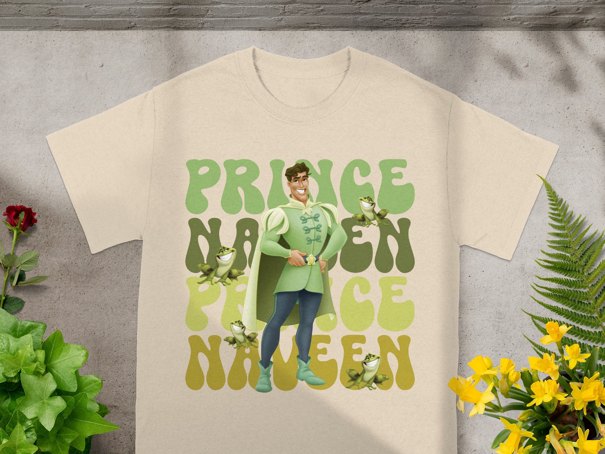Prince Charming illustration with "Prince Charming" text on a light tan t-shirt.