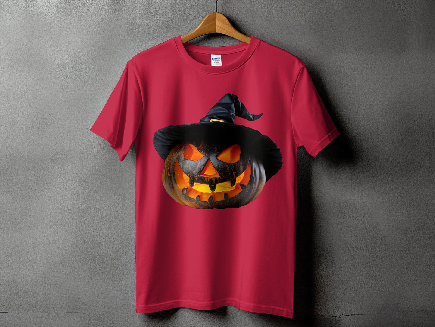 Red t-shirt with a jack-o'-lantern wearing a witch hat graphic.