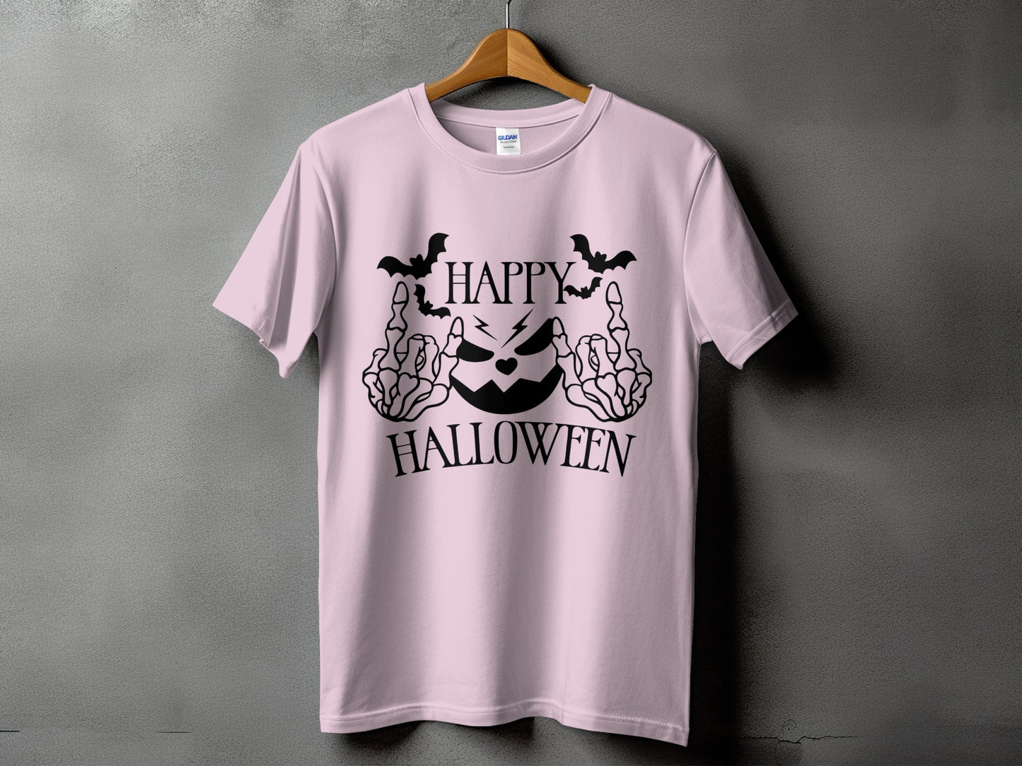 Pink t-shirt with "HAPPY HALLOWEEN" text and a skeleton hand graphic.