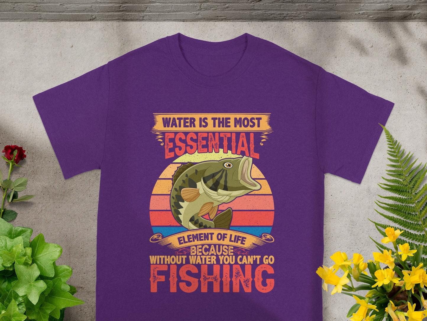 Purple t-shirt with graphic featuring a fish and text about fishing.