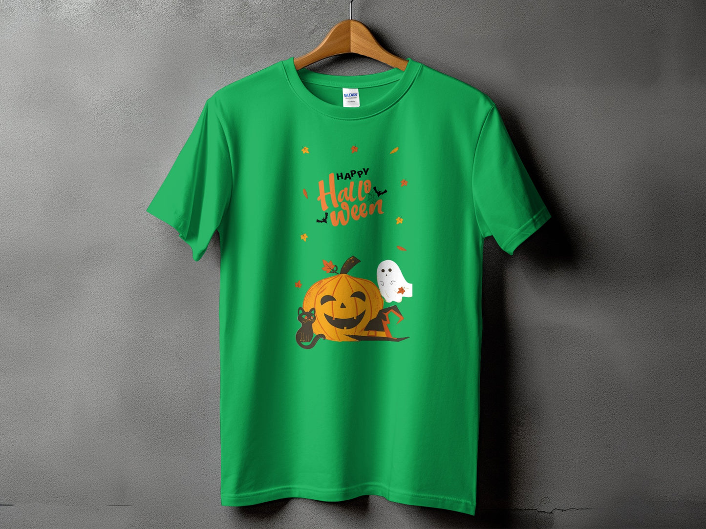 Green t-shirt with "Happy Halloween" text, pumpkin, cat, ghost, and witch hat design.